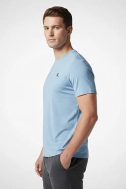 Men in Körperpflege Sky Blue Heather Ultra Lux Performance Tee Side View Men in Körperpflege Sky Blue Heather Ultra Lux Performance Tee Side View